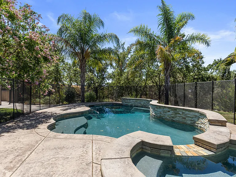 fenced pool/spa area