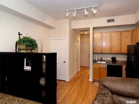 View of Entrance/Kitchen. Stackable washer/dryer in closet remain.