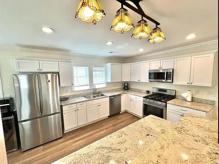Renovated kitchen with stainless steel appliances