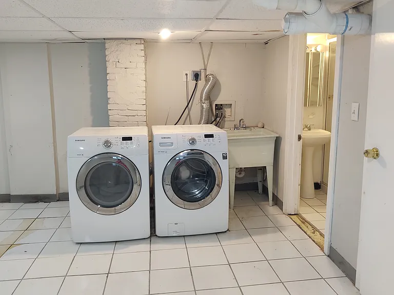 Laundry, basement storage, additional full bathroom access