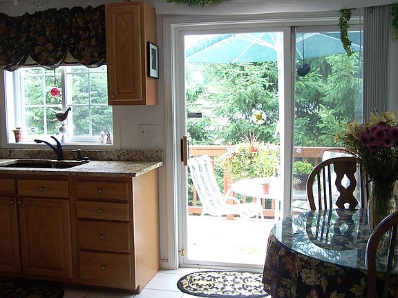 Eat In or Out on your tree lined deck