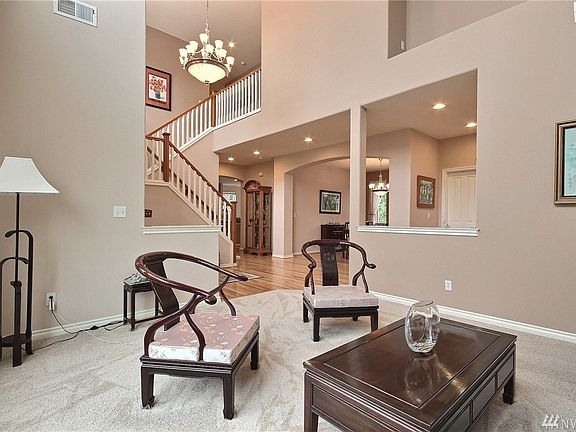 View of entry dining room & staircase from living room