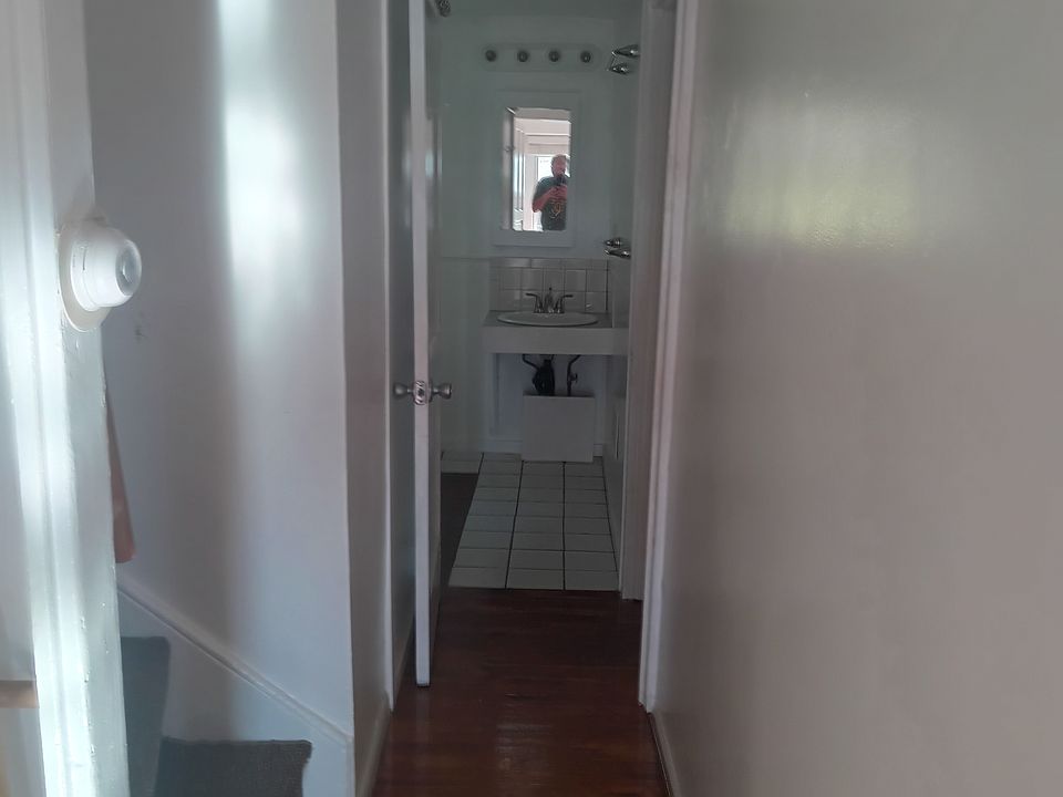 View down the hall to bathroom