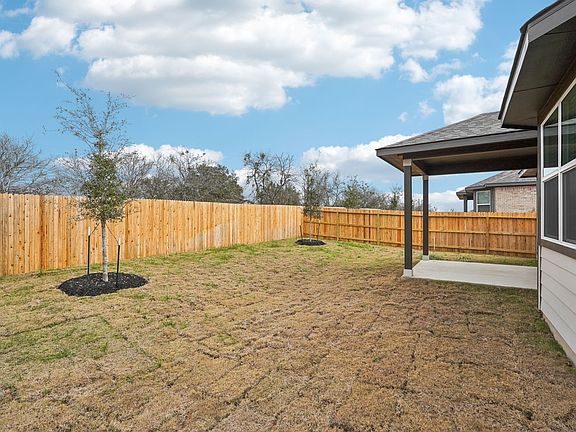 Back exterior of the Sabine floorplan at a Meritage Homes community.