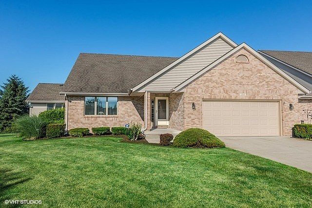 Stunning end unit townhome with quality throughout!