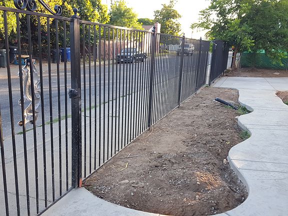 wrought iron fence troughout