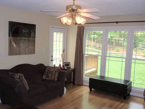 Den with view of backyard