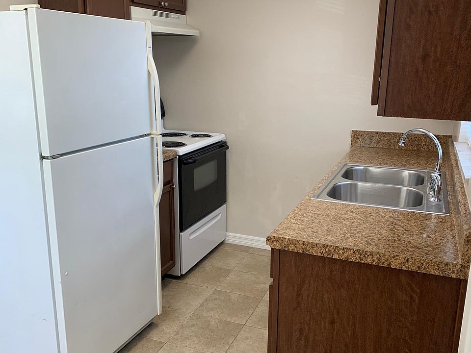 Newer appliances and kitchen cabinets.