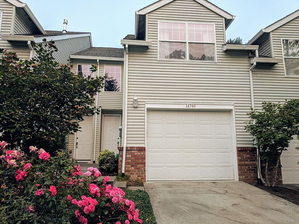 Exterior of townhome showing single car garage