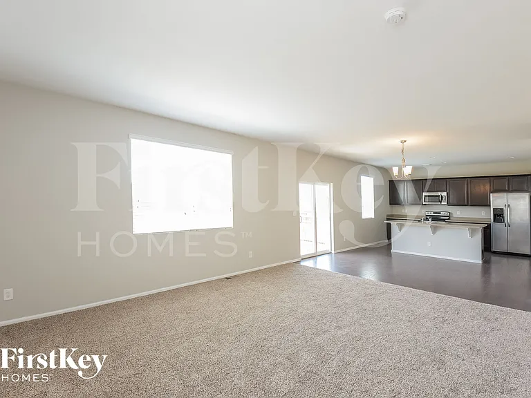 6481 N Dunkirk Ct — Photo 4