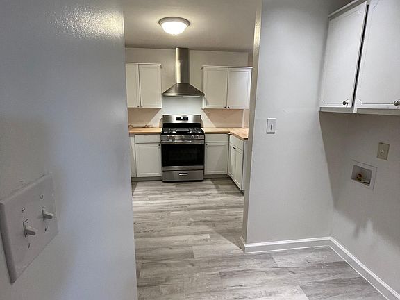 looking at unfinished kitchen. through laundry access.