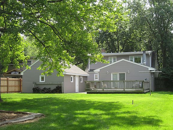 Rear view of house, garage and deck