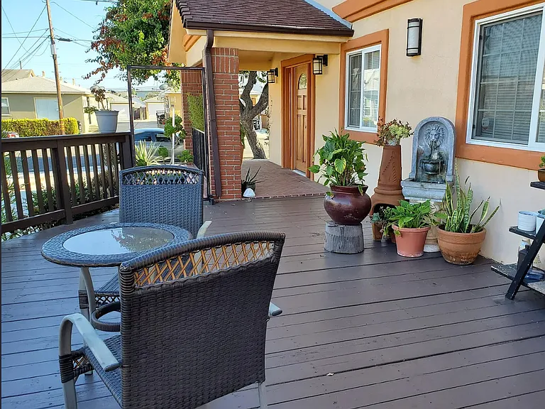 Front deck with plants & furniture