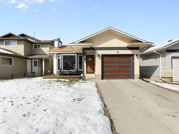 48 S Cedargrove Rd SW, Calgary, AB T2W 4T9