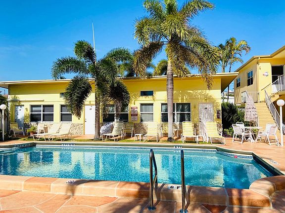 lounges, tables and chair provided so you can relax around the pool area