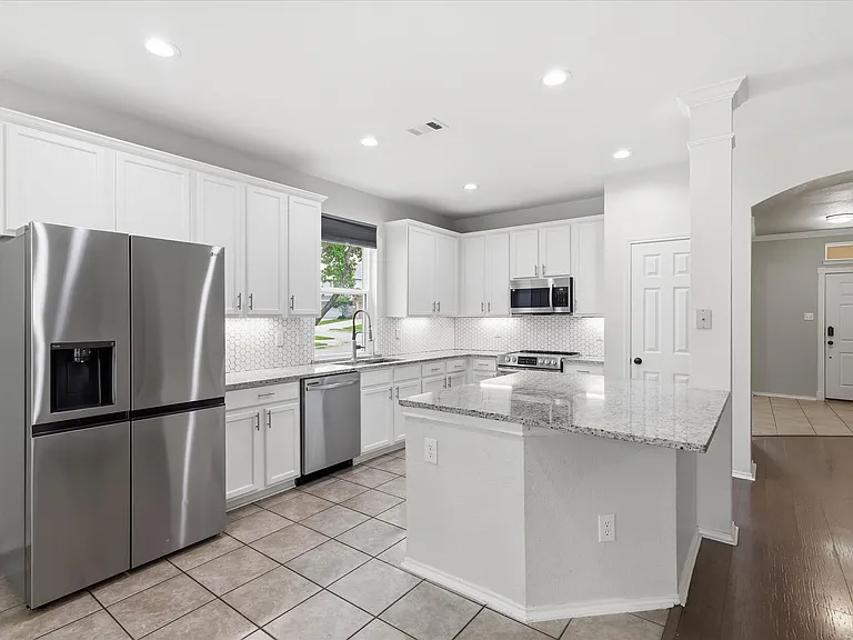 Kitchen with granitce countertops and all appliances
