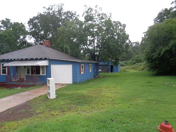 House, yard and garage