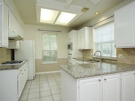 Kitchen with granite countertop