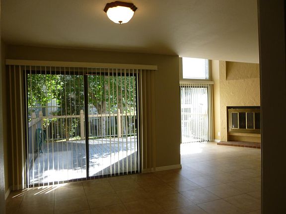 Dining Area with Deck View of Greenbelt