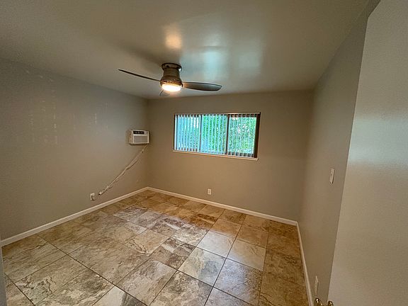 Second bedroom with contemporary tile