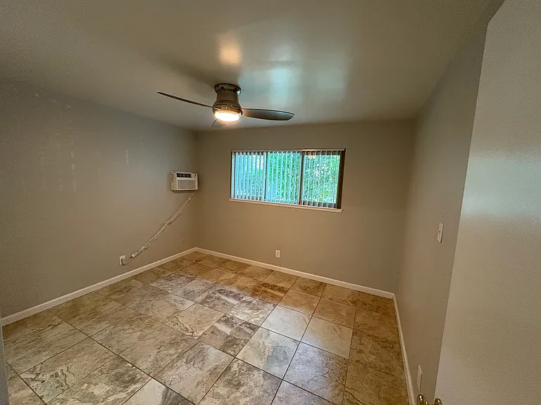 Second bedroom with contemporary tile