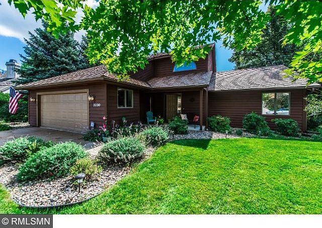 Beautiful landscaped 2 story 5 bed 3 bath on pond with view of Hazelton Golf coarse. Sprinkler system and new cedar shingle roof!