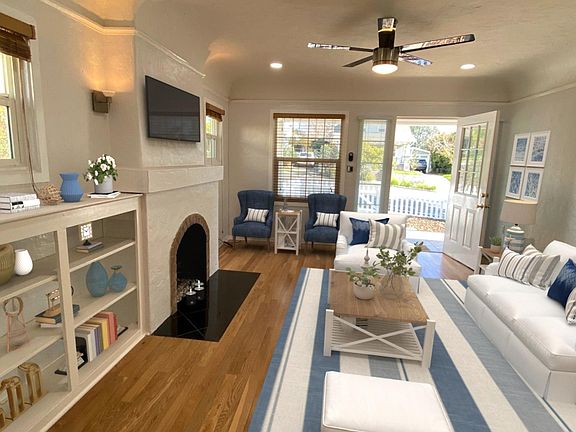 Large open living room with built-ins