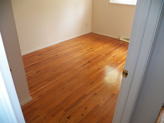 bedroom 1 w/oak floors