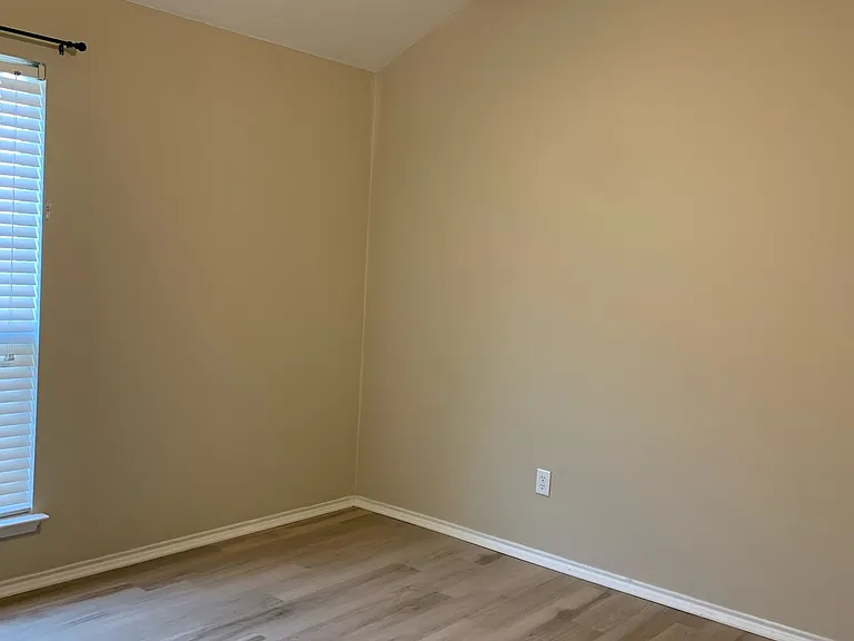 One of two secondary bedrooms.