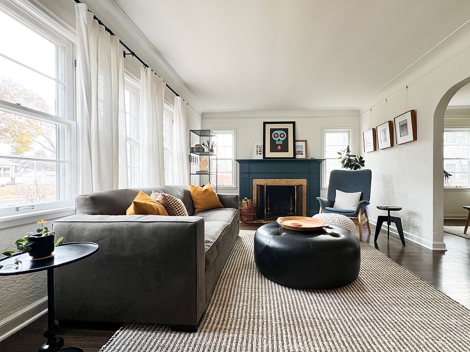 Living room with wood burning fireplace