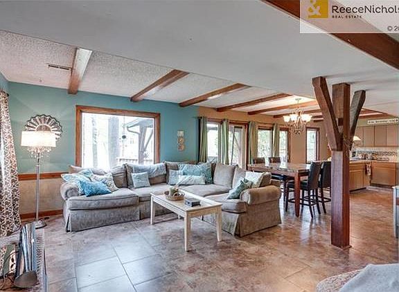 WIDE OPEN LIVING SPACE WITH WALL OF WINDOWS