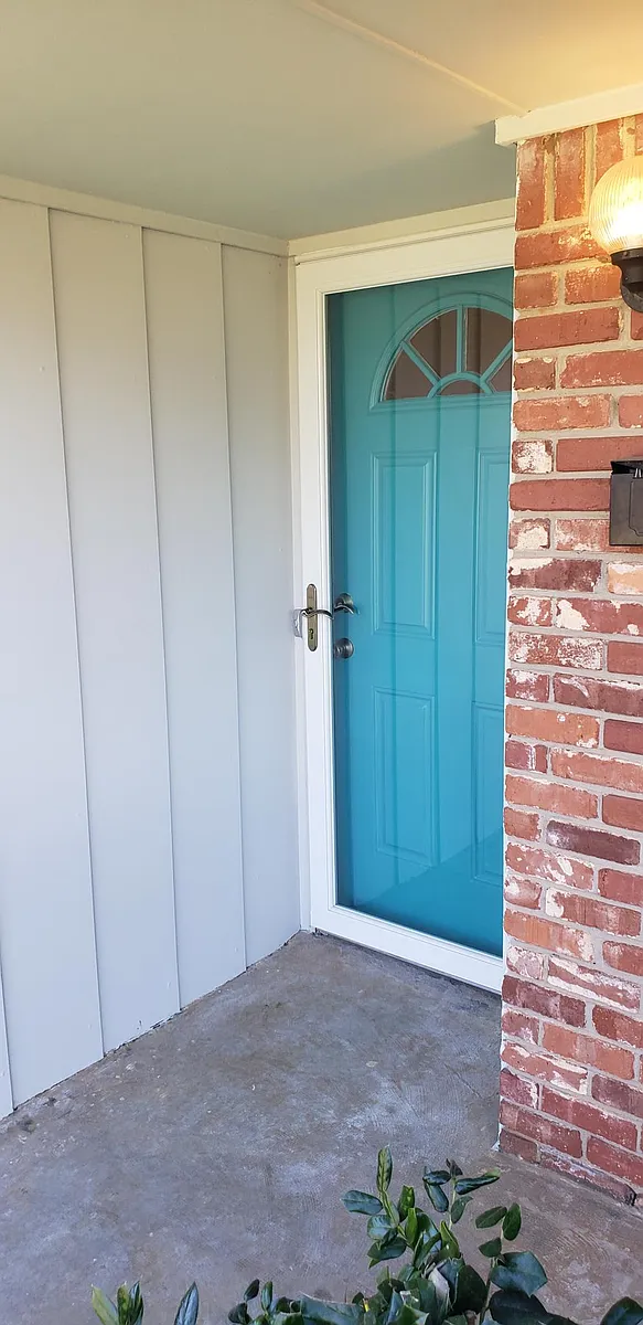NEWLY PAINTED DOOR IN 2022 - 1324 E Boyd St