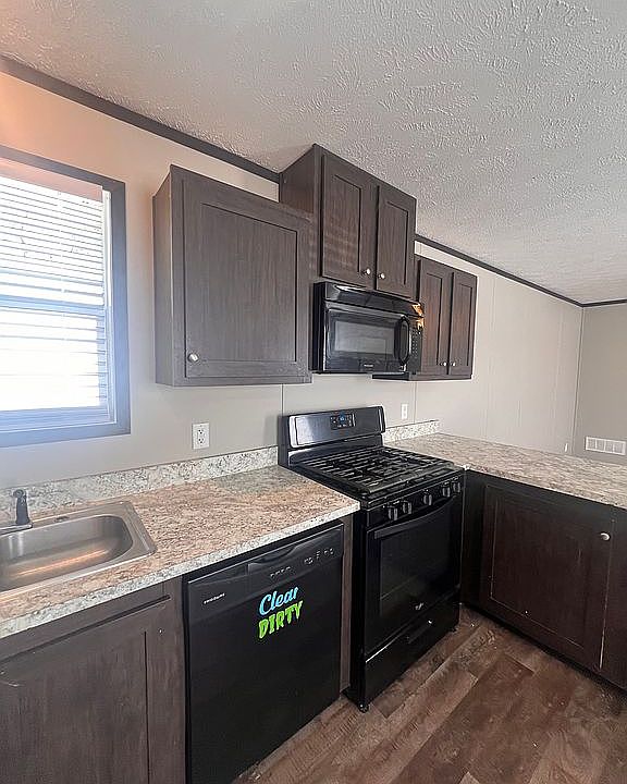 1st image of 534 E 37th Ave Lot 387