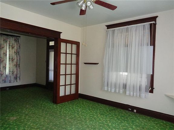 Living Room with French Doors looking into the Foyer.