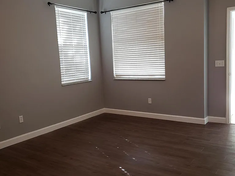 Master bedroom with new wood floors