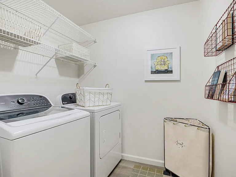 Large laundry rooms with full-size washer and dryer