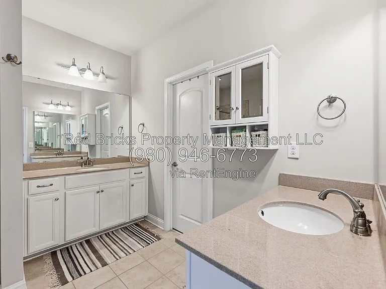 9659 Camberley Ave NW — Photo 29
