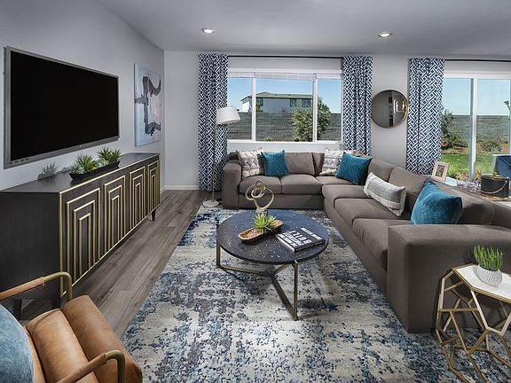 Residence 2 living room modeled at a nearby Meritage community.