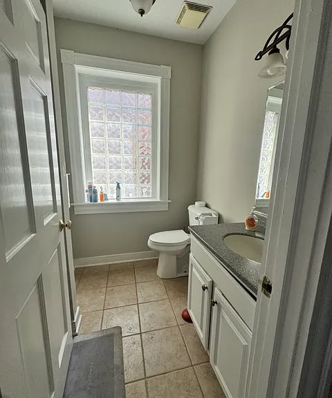 Upstairs bathroom. The shower is behind the entrance door.