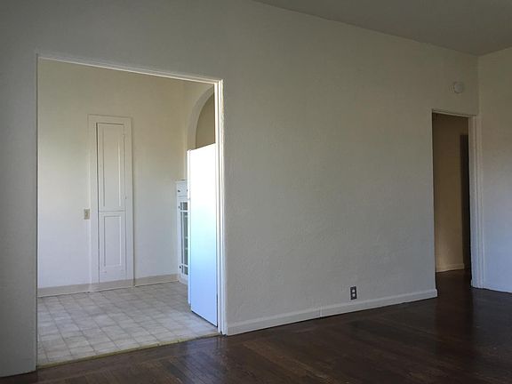 Living room leading to kitchen