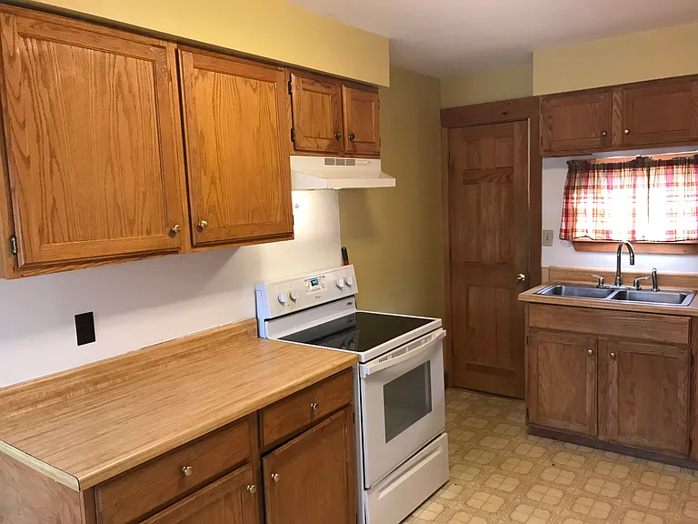 All lower cupboards and countertop have been newly installed.