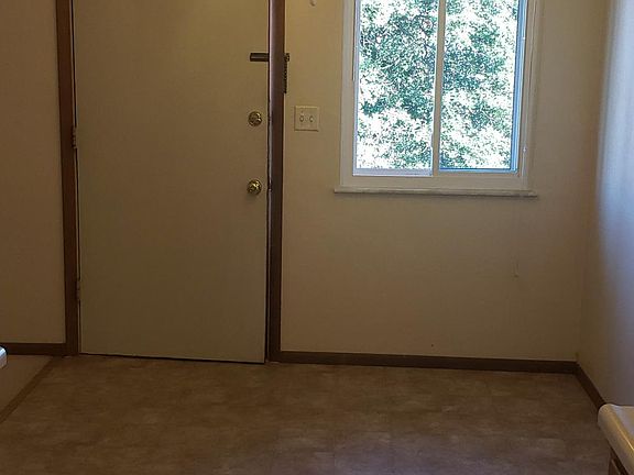 View of front door in kitchen.