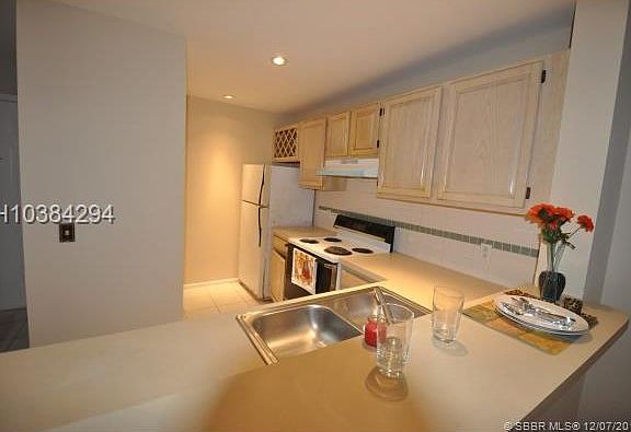 2nd image of 1865 Palm Cove Blvd #9-205