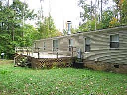 huge back yard with big deck great for entertaining