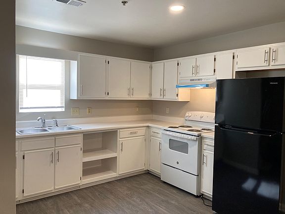 NEW APPLIANCES AND LOTS OF CABINETRY IN THIS UPDATED KITCHEN