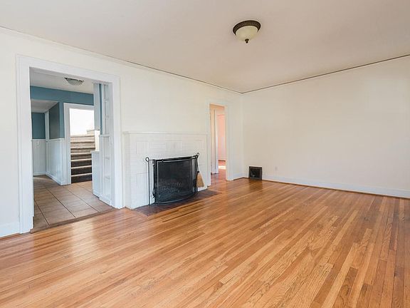 Living Room with wood burning fireplace.
