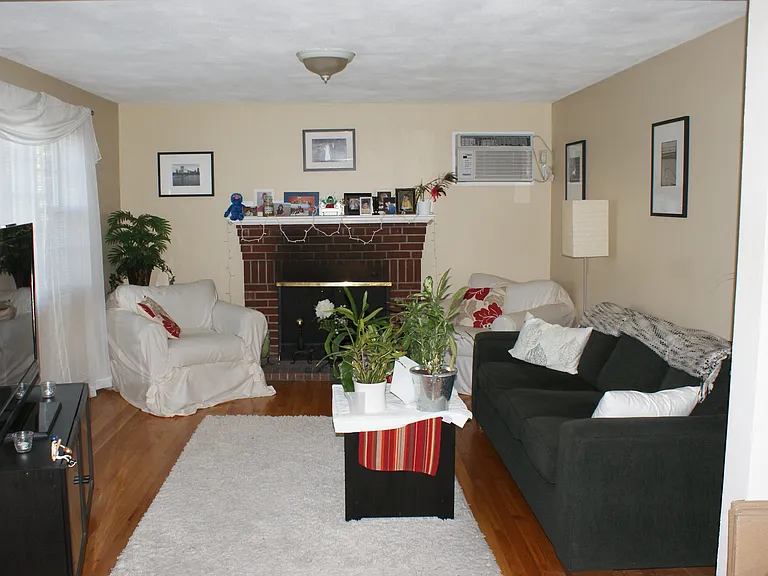 Living room shown with furniture in it.