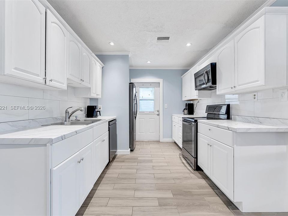 1st image of 660 NE 59th Ct
