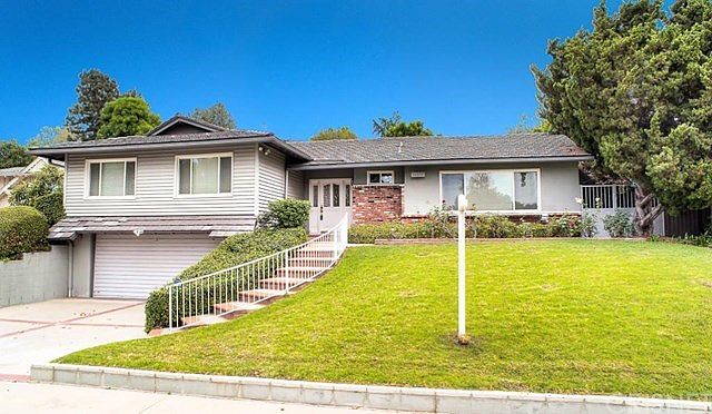 This charming family home is located in the desirable "Walnut Cove" area and situated on one of the nicest street in the neighborhood with it's relaxing tree lined appeal.