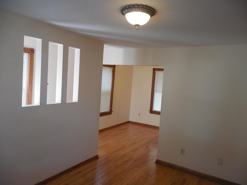 LIVING ROOM LOOKING TO OFFICE AREA